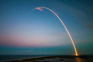 ray of light near body of water by SpaceX courtesy of Unsplash.