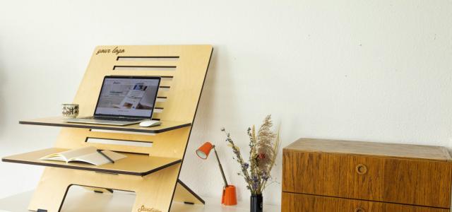 a desk with a computer on top of it by Standsome Worklifestyle courtesy of Unsplash.